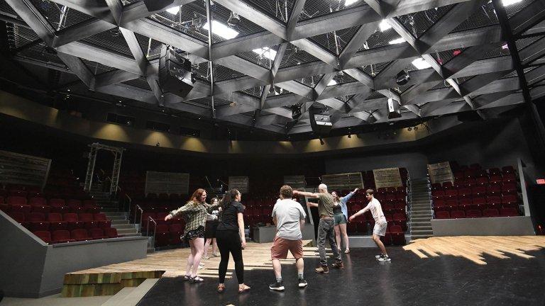 Centre student actors warming up before a performance